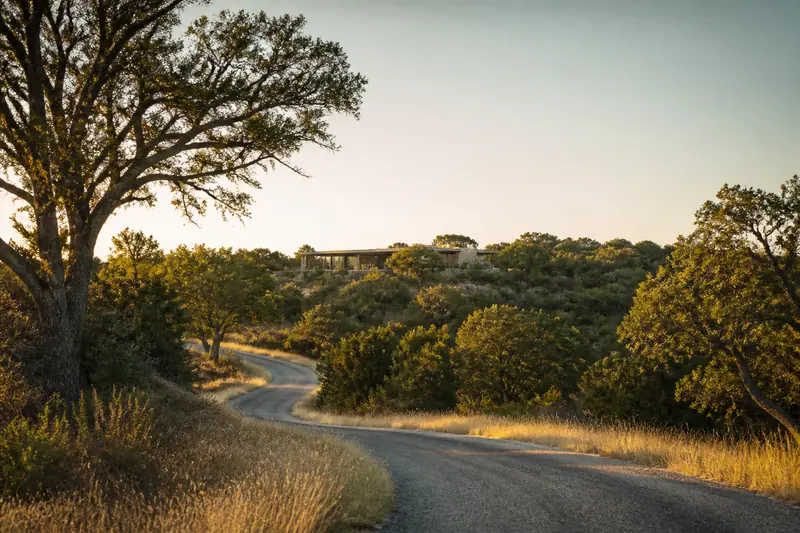 Winding road through the Hill Country at golden hour